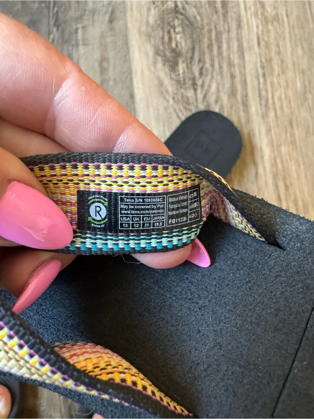 Teva Kids Black Flip Flops with Rainbow Striped Straps